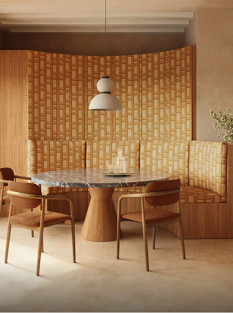Salle à manger aux tons chaleureux avec revêtement mural graphique